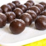 Rolled Chocolate brownies in rows on a plate with salt sprinkled on top