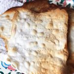 Paleo Grain-Free Matzo (from Predominantly Paleo) on cotton cheesecloth on a placemat