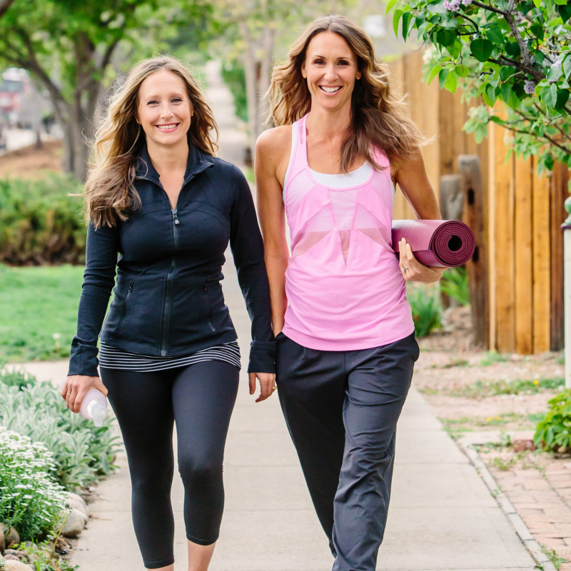 Jo and Jules walking with yoga mat