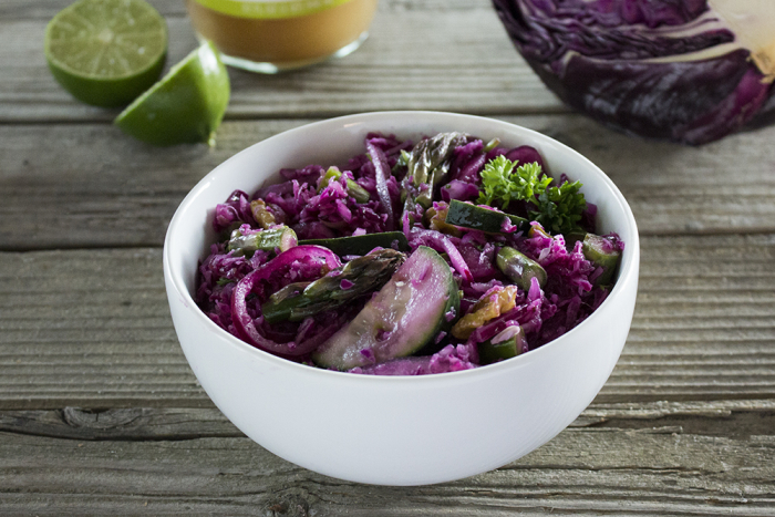 White bowl with a blend of veggies on a wooden table